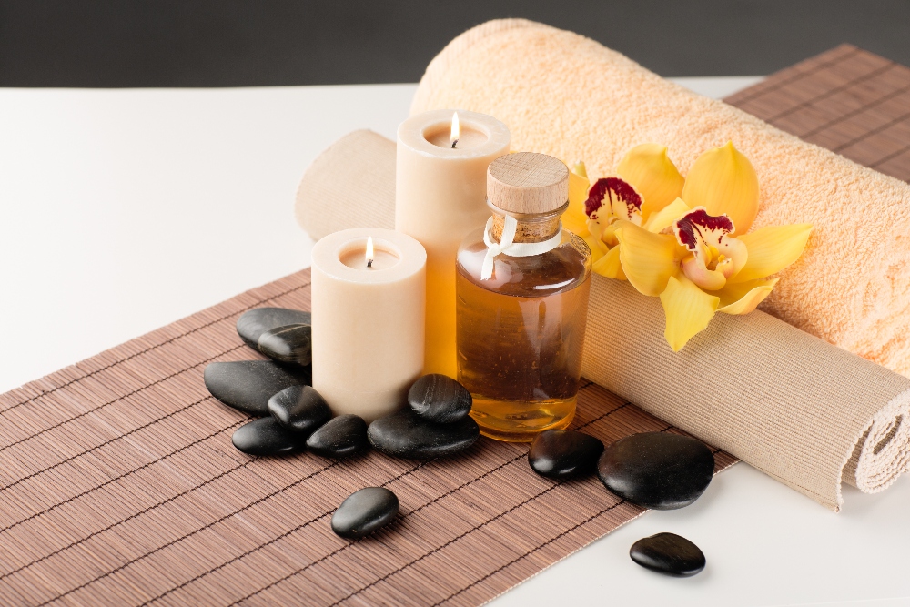 Massage oils, towels and hot stones
